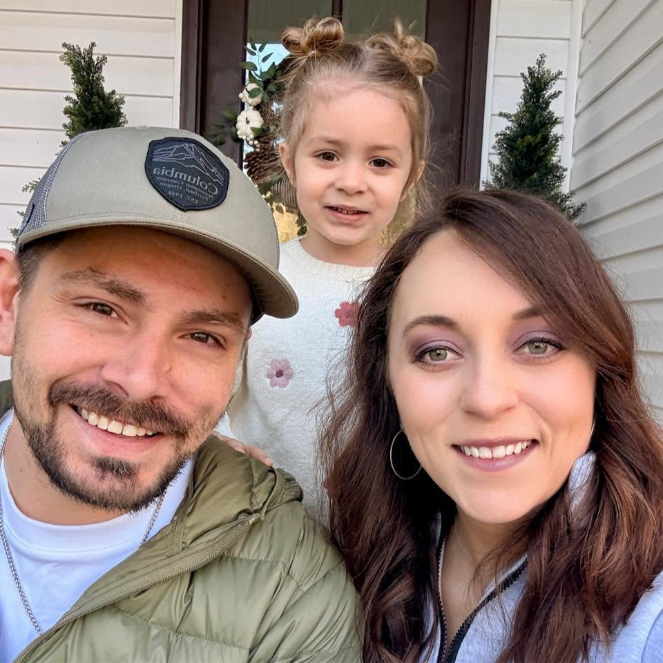 The owners of The Plays2b with their daughter